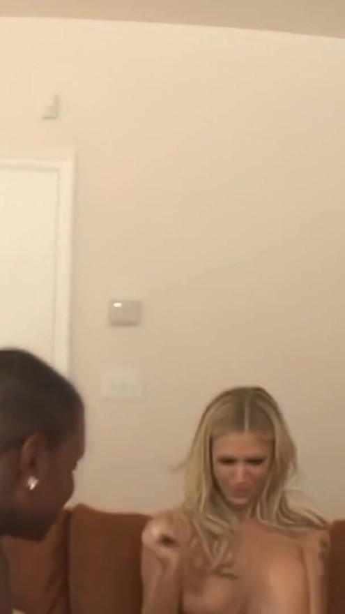 A blonde intercourses with a black man in the presence of a buddy, resulting in a facial. | Clip 1