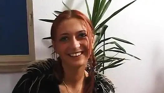 Amazing redhead blowing cock