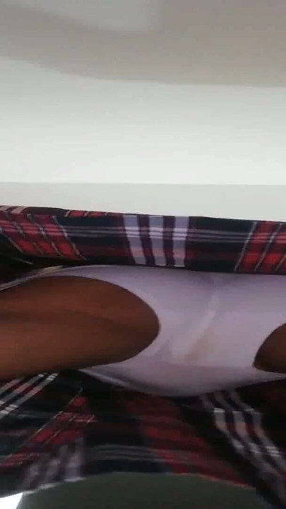 Cute hot schoolgirl shows off her white panties under her skirt, with POV surprise | Clip 1