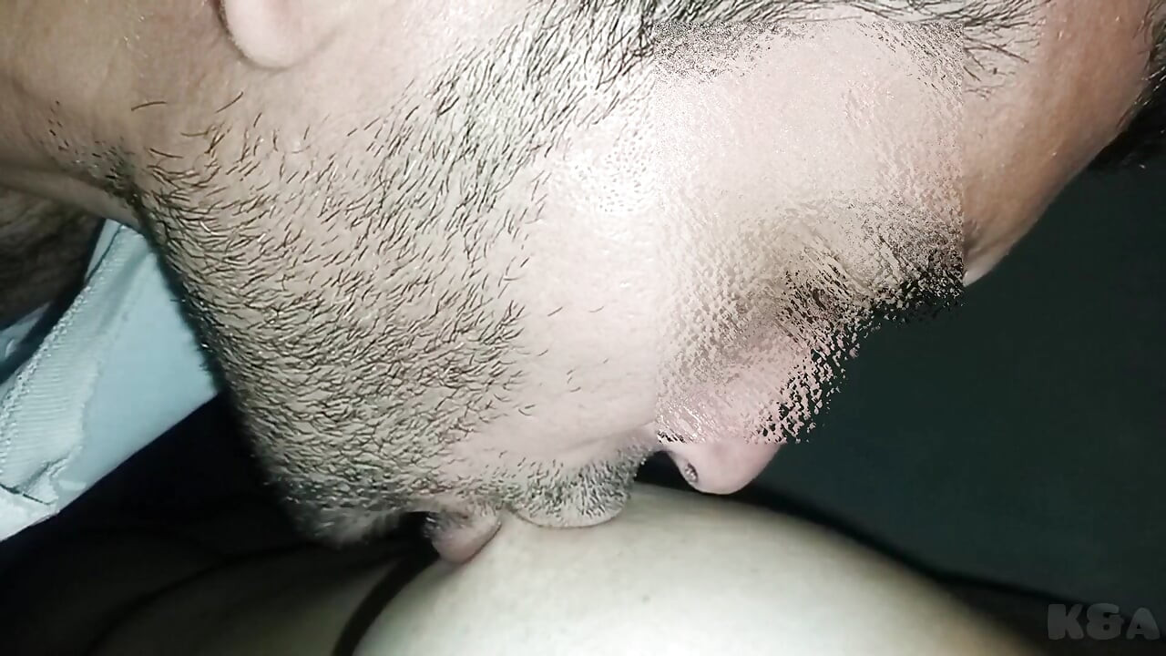 My husband plays and sucks my swollen nipples, I am warmed by the rich sounds he makes when he licks my juicy tits
