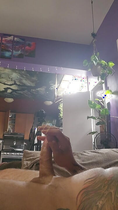 close up of big cock lubed up being stroked till it cum