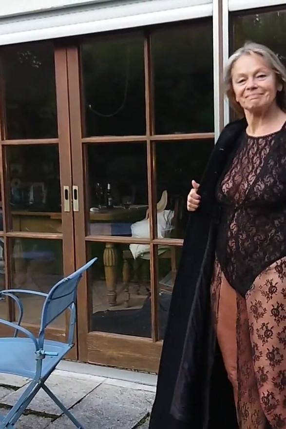 A Mature Woman Shows off Her Figure Outside in a Lace Bodysuit!