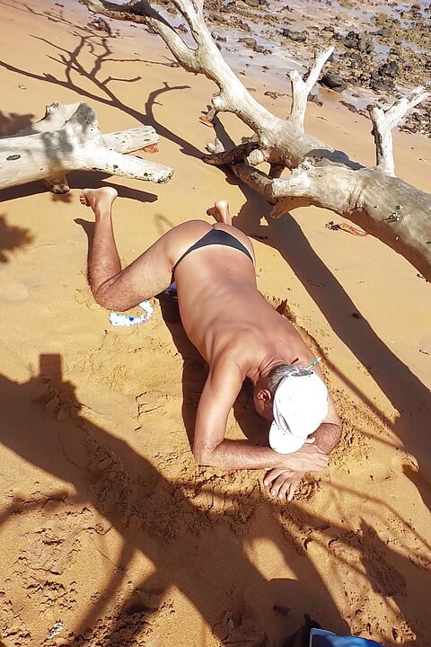 Ladysilva on the beach in panties with her hot ass