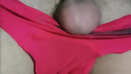 Playing with the big thick cock under the red underwear