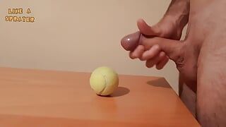 Handjob and cumshot on tennis ball