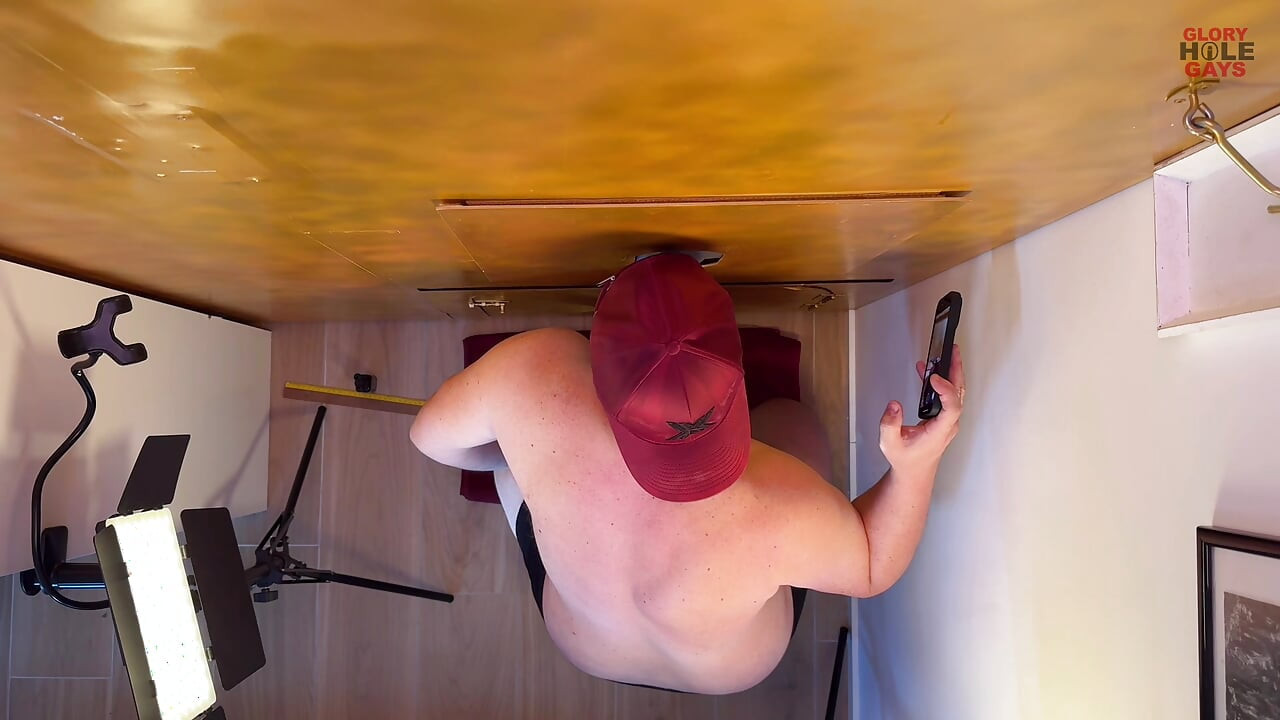 Cum condom play at gloryhole