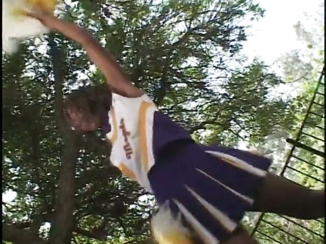 Pretty ebony cheerleader enjoys white cock banging