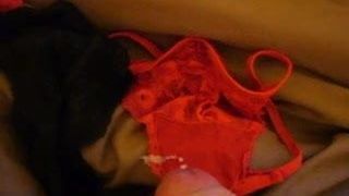 cumming on a red lace thong