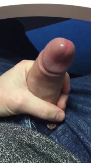 Playing with precum on dick