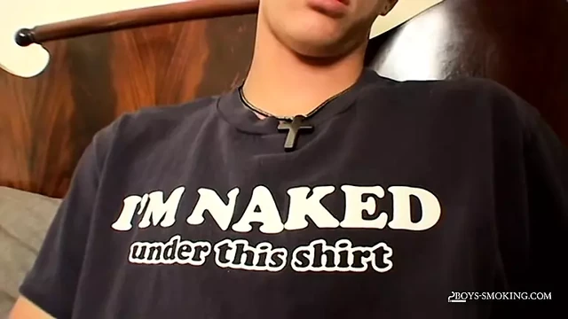 BoysSmoking: Heavy smoker Cain fires his cigarette and starts stroking his throbbing boner