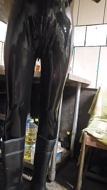 Latex catsuit and wellies