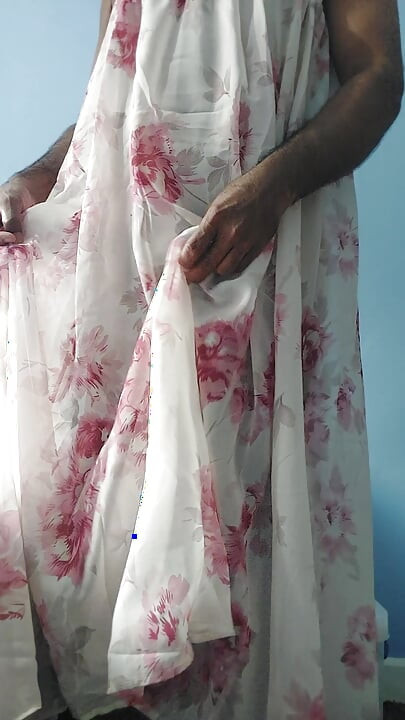 I'm masterbating in a flowery flowing silky seethrough fleard skirt and cum