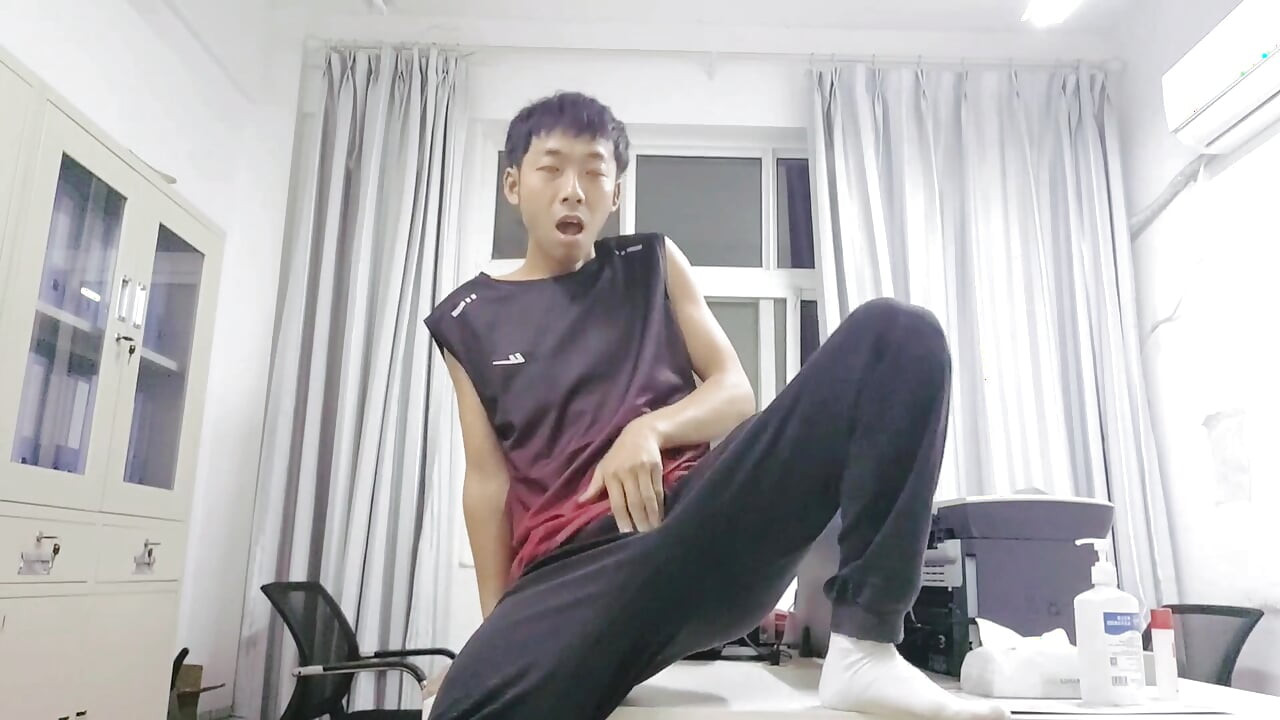 Cute Asian boy passionately masturbates, moans, ejaculates, and eats semen in the college office