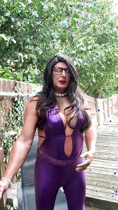Sexy Crossdresser kellycd2022 in purple pvc catsuit and heels