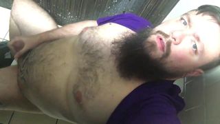 Bearded bear cums in bathroom