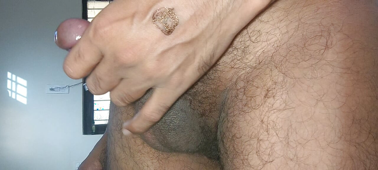 Indian massaging big cock cum later