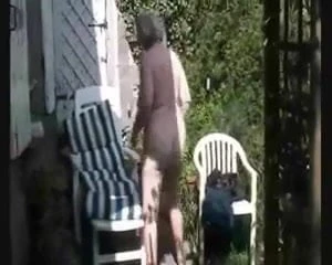old lady in a yard