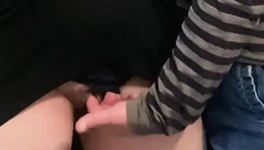 Возбужденный извращеец трахает пальцами девушку под платьем на публике