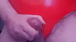 Chubby grandpa wearing red latex bodysuit wanking a semi and cumming for 3 minutes plus