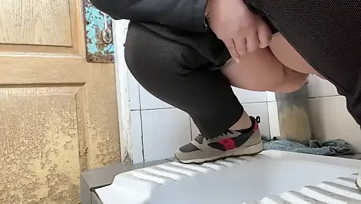 Mature MILF Pees in a Hospital Public Toilet