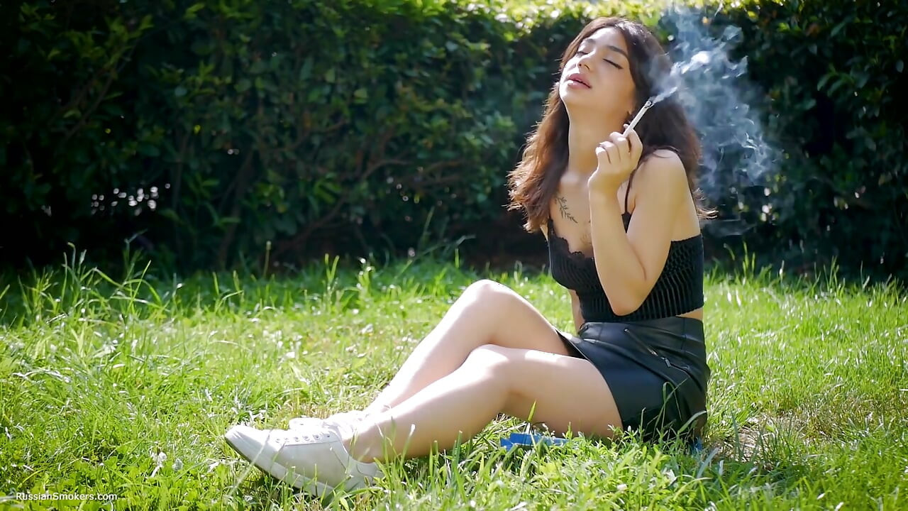Arina Is Smoking 120mm Cigarettes Outdoors