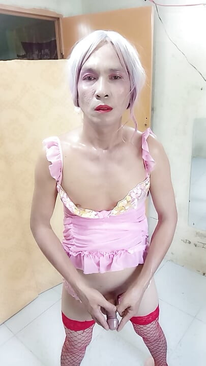 Oanh Le transgender wearing sexy and pornographic clothes standing and screaming is extremely happy