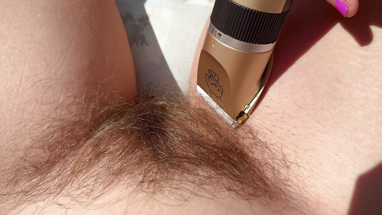 Trimming my bush and my hairy legs closeup outdoor