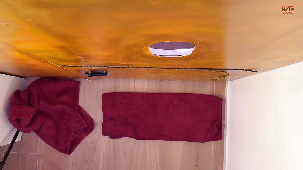 Young straight guy with a big cock at the gloryhole