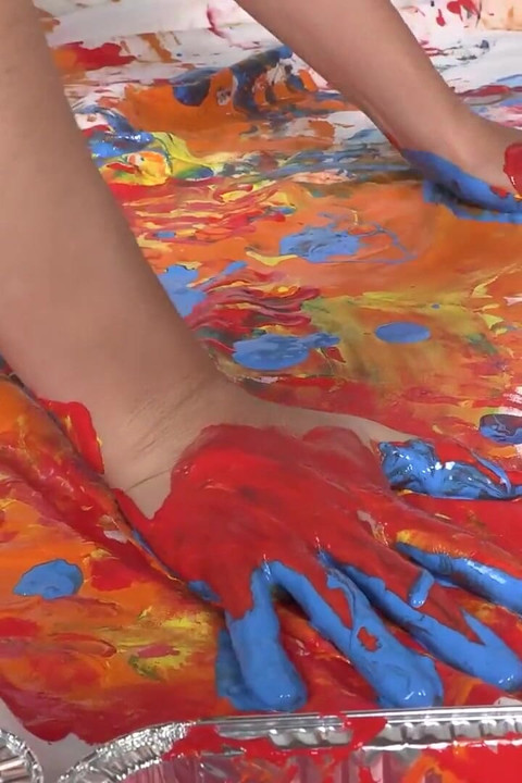 Brunette Diva Coats Her Feet and Hands with Paint to Create an Award-winning Art