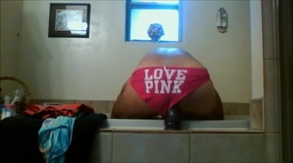 Jaxpantyguy with his pink panties and purple dildo