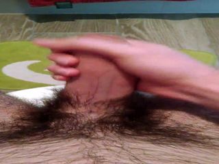 Jerking off hairy cock to climax