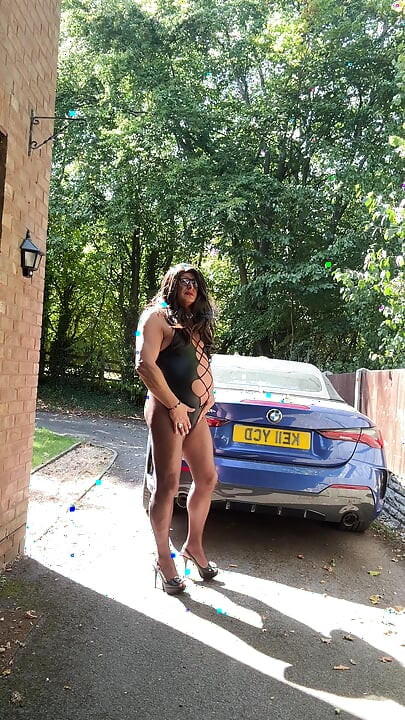 Sexy Crossdresser Kellycd2022's in black pvc bodysuit and fishnet pantyhose