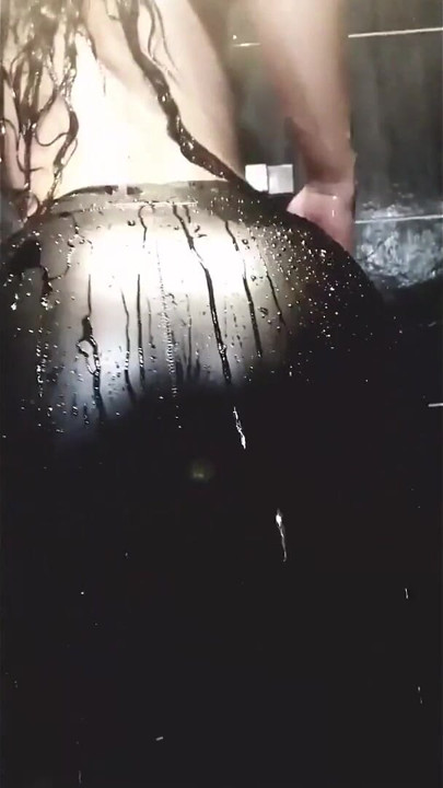 Tattooed MILF Teases Her Curves in Wet Leather