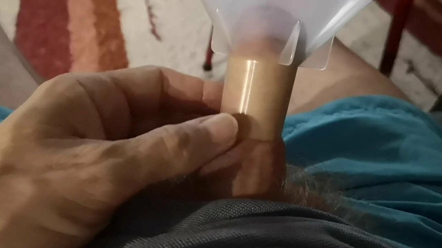 Jerking off with and without a funnel while watching TV