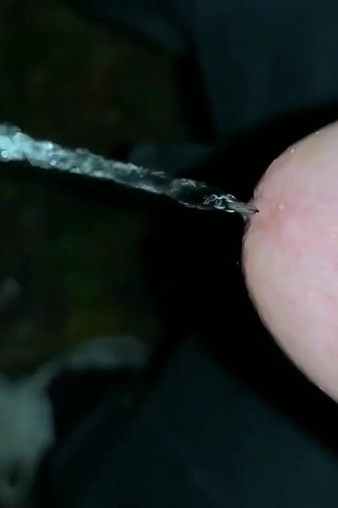 Slowmotion and Close up. Unwashed Uncut Cock Piss on the Ground Outdoor. Long Piss Stream