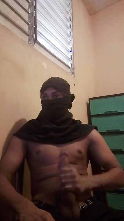 Masked big black cock masturbates
