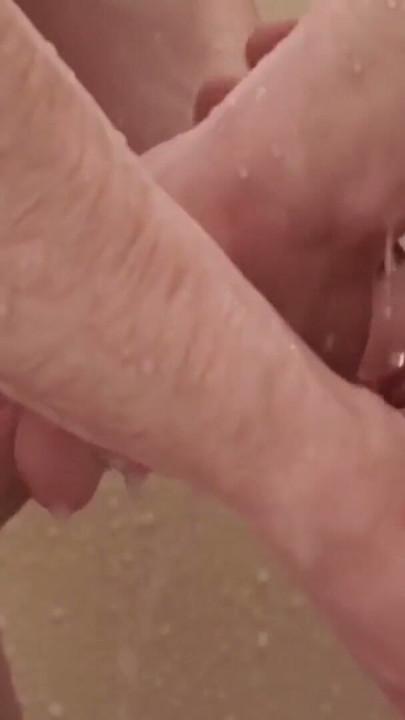 Elder jerks off his big cock while watching jocks in shower | Clip 1