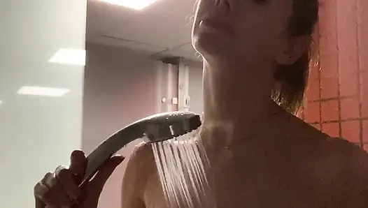 Cute girl with a amazing body takes a shower after the gym