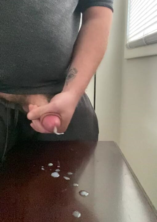 Jacking off my big cock spraying cum on the table