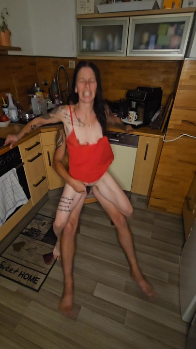 Captivating moment from "Wife fucked in the kitchen"