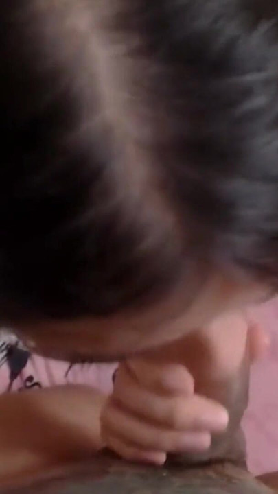 A petite girlfriend gives a footjob and a blowjob | Clip 1