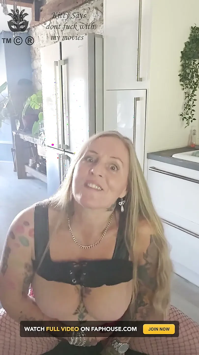 Black Leather and 2 Big Black Dildos