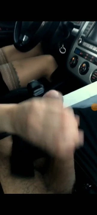 She jerks him off while driving