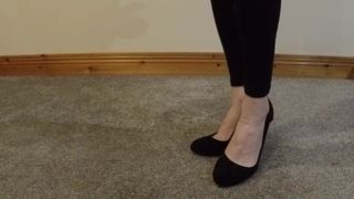 Male strutting in black court shoes tease