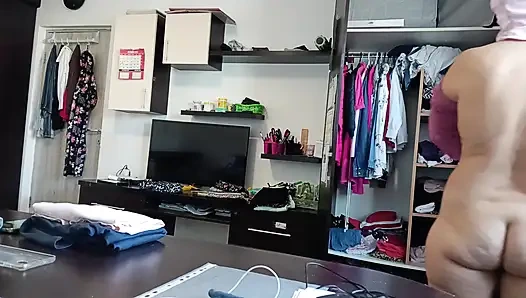 Amateur Woman Has Fun Trying on Clothes and Cutting Them.