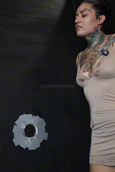 She Gets Fucked in a Glory Hole with a Fist in Her Pussy