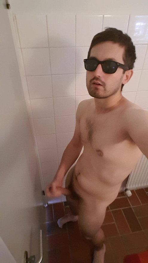 Horny guy rubbing one out in the bathroom, with cumshot