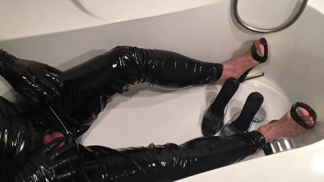 PVC, Heels and Piss Play in Bath Tub