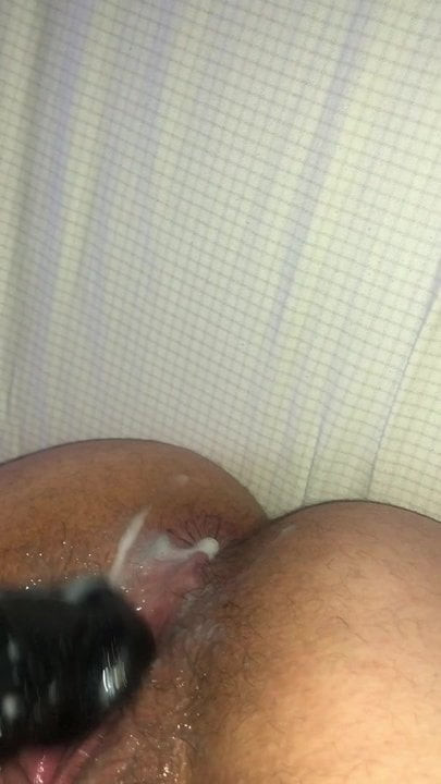 Creamy pussy on black dildo