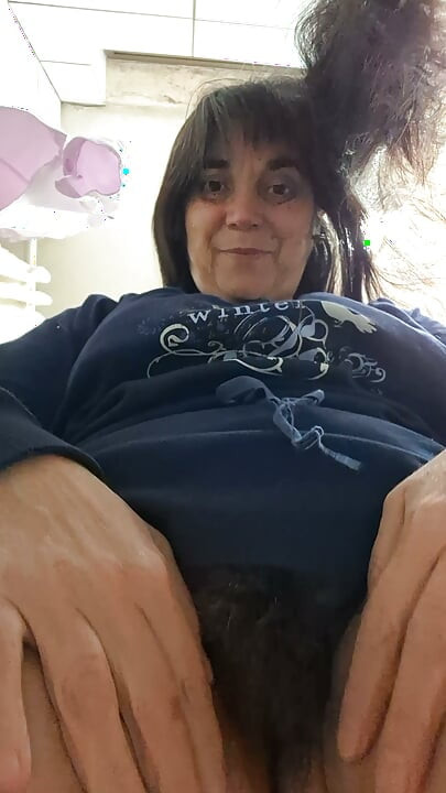 You can see hairy pussy in her short dress.